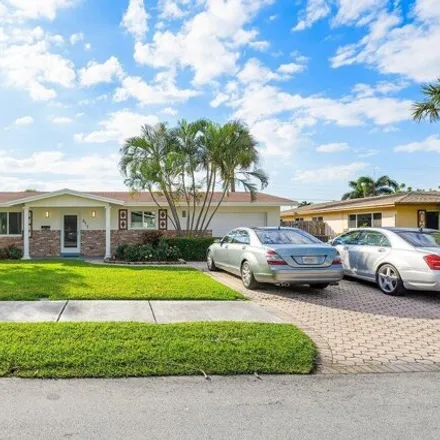 Rent this 4 bed house on 779 Southeast 7th Street in Barwal, Deerfield Beach