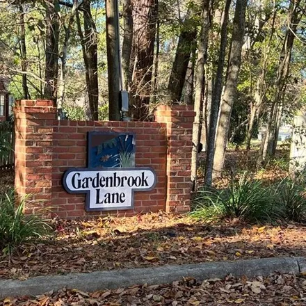 Rent this 2 bed townhouse on 2048 Gardenbrook Lane in Tallahassee, FL 32301