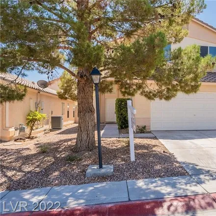 Buy this 4 bed house on 8937 Iron Hitch Avenue in Las Vegas, NV 89143