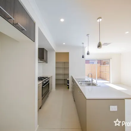 Rent this 3 bed apartment on Altis Road in Weir Views VIC 3338, Australia