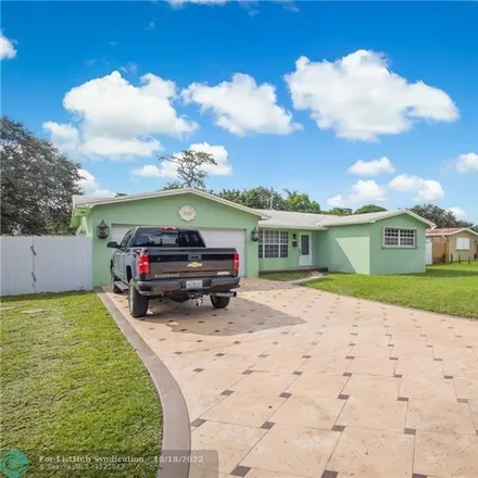 Buy this 4 bed house on 308 Southwest 68th Avenue in Pembroke Pines, FL 33023