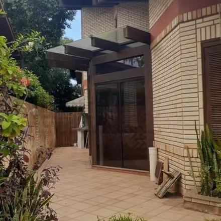 Buy this 7 bed house on Pousada das Samambaias in Rua Deputado Paulo Preis, Jurerê