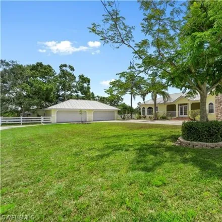 Buy this 3 bed house on 6816 Nalle Grade Road in Lee County, FL 33917