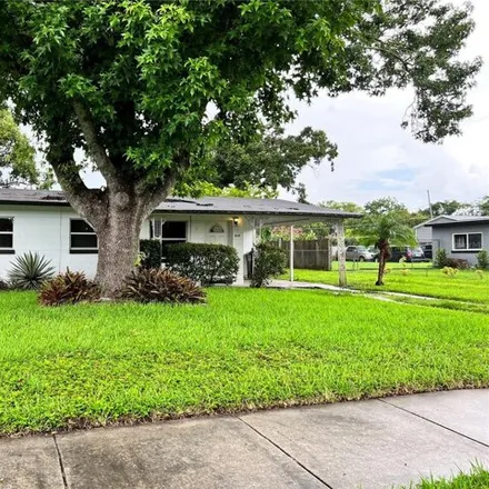 Rent this 3 bed house on 2990 Touraine Avenue in Conway, FL 32812