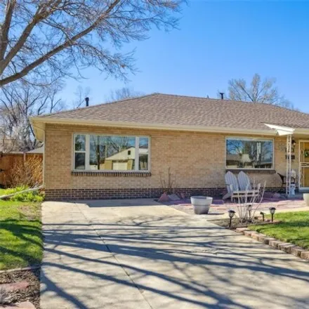 Buy this 4 bed house on 7114 West 43rd Avenue in Wheat Ridge, CO 80033