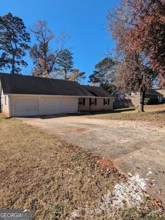 Buy this 4 bed house on 3975 Seven Hills Trail in DeKalb County, GA 30083