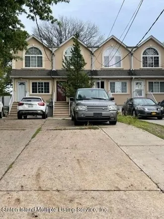 Buy this 4 bed townhouse on 389 Morningstar Road in New York, NY 10303