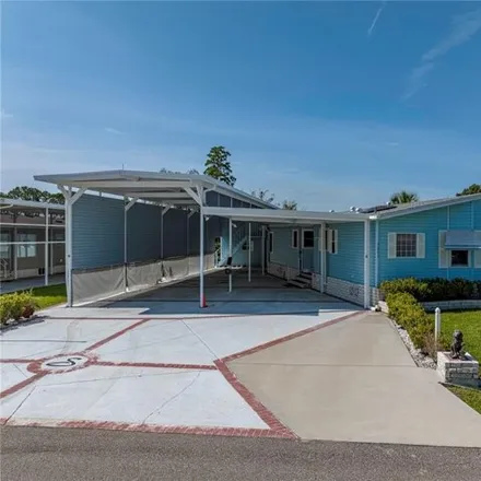 Buy this studio apartment on 5025 Northshore Drive in Polk County, FL 33868