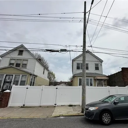 Buy this 4 bed house on 9116 Bedell Lane in New York, NY 11236