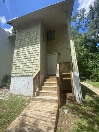 Buy this 4 bed townhouse on 1510 North Paul Russell Road in Tallahassee, FL 32301