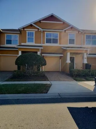 Rent this 3 bed townhouse on 1159 Honey Blossom Drive in Orange County, FL 32824
