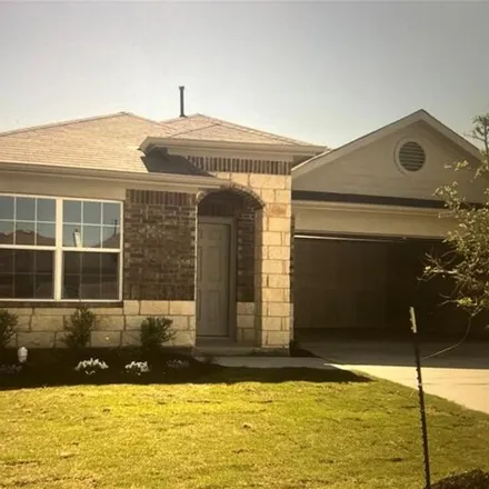 Rent this 4 bed house on 11025 Night Camp Dr in Austin, Texas