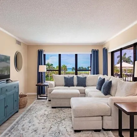 Buy this 2 bed condo on Solamar in Gulf Shore Boulevard North, Naples