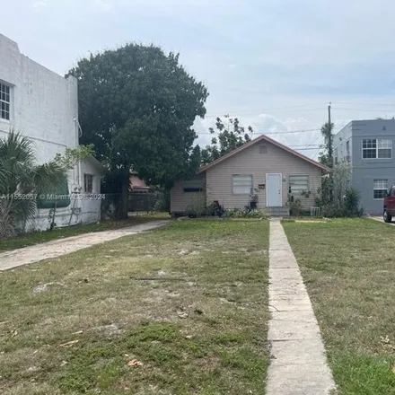 Buy this 3 bed house on 684 42nd Street in West Palm Beach, FL 33407