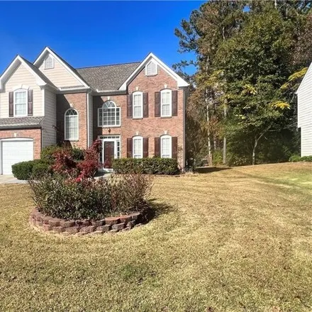 Buy this 3 bed house on 1566 Woodmore Drive Southwest in Cobb County, GA 30008