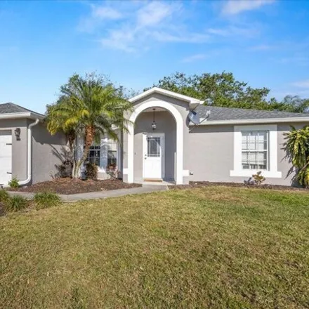 Buy this 3 bed house on 4247 Southwest Utterback Street in Port Saint Lucie, FL 34953