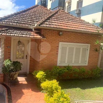 Buy this 3 bed house on Rua Roque Calage in Passo da Areia, Porto Alegre - RS