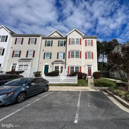 Rent this 3 bed townhouse on 8001 Brookstone Court in Meade Village, Severn