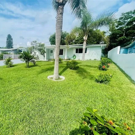 Buy this 4 bed house on 2366 Tahitian Drive in Holiday, FL 34691