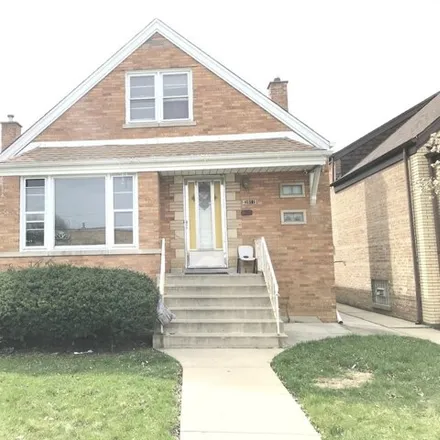Buy this 4 bed house on 3911 West 71st Street in Chicago, IL 60629