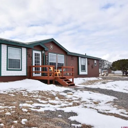Buy this studio apartment on 399 Crow Trail in Rio Grande County, CO 81154