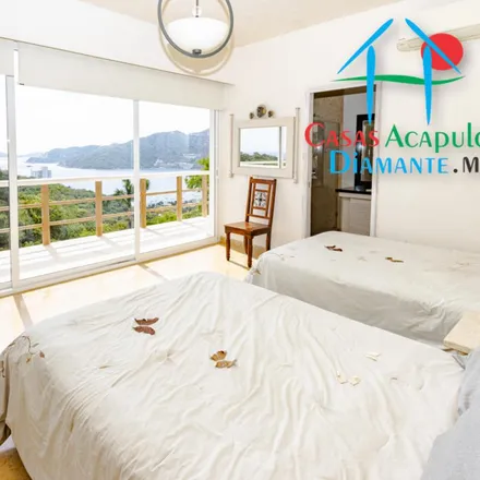 Buy this 4 bed house on Privada Paseo de las Rocas in Fracc. El Pueblito del Revolcadero, 39890 Puerto Marqués