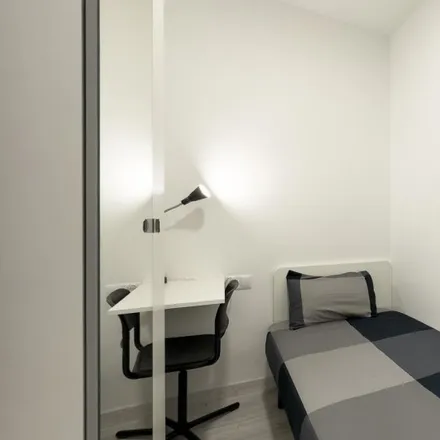 Rent this 3 bed room on Carrer de Sant Roc in 08001 Barcelona, Spain