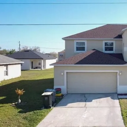 Rent this 4 bed house on 681 Bittern Court in Polk County, FL 34759
