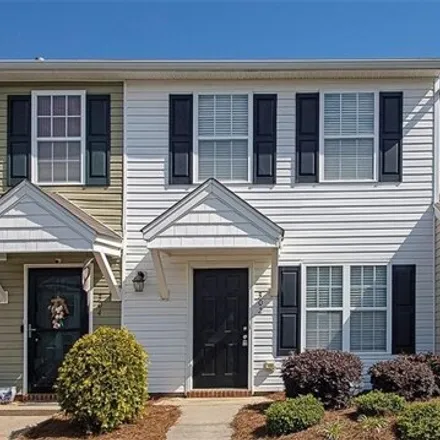 Rent this 2 bed townhouse on 443 Mourning Dove Terrace in Greensboro, NC 27409