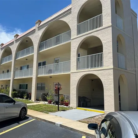 Buy this 2 bed condo on 2258 World Parkway Boulevard in Palm Harbor, FL 33763
