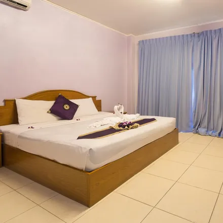 Rent this 1 bed room on Lee Guesthouse in Soi Banzan, Patong