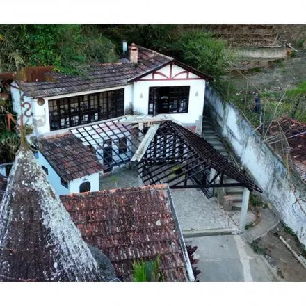Buy this 4 bed house on Estrada União e Indústria in Pedro do Rio, Petrópolis - RJ