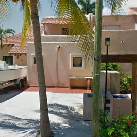 Buy this 6 bed house on Puerto Aventuras Golf Course in Privada Bahía Solimán, 77782 Puerto Aventuras