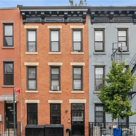 Buy this 6 bed townhouse on 164 West 9th Street in New York, NY 11231