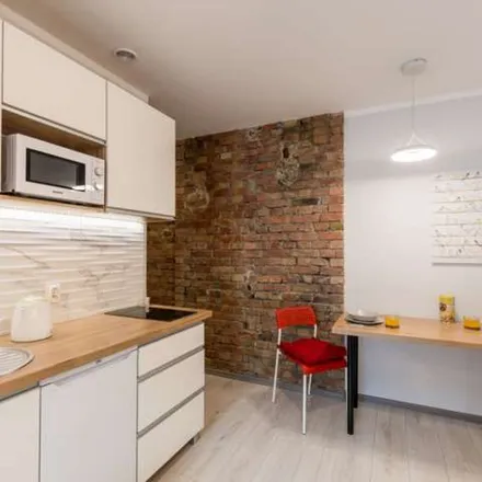 Rent this 1 bed apartment on Garncarska 8 in 61-819 Poznan, Poland