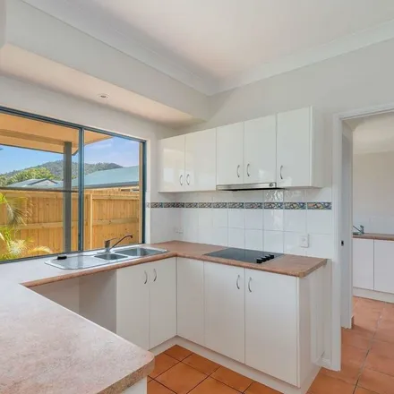 Rent this 2 bed apartment on Erromango Drive in Jubilee Pocket QLD 4802, Australia