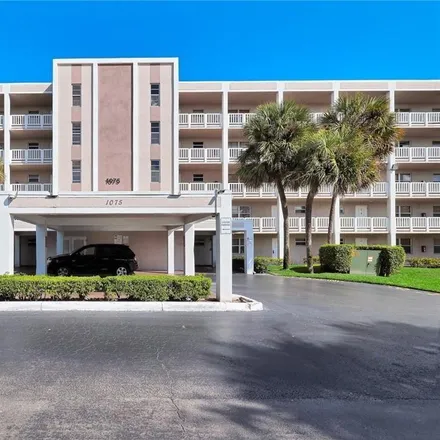 Buy this 2 bed condo on 1075 Riverside Drive in Coral Springs, FL 33071