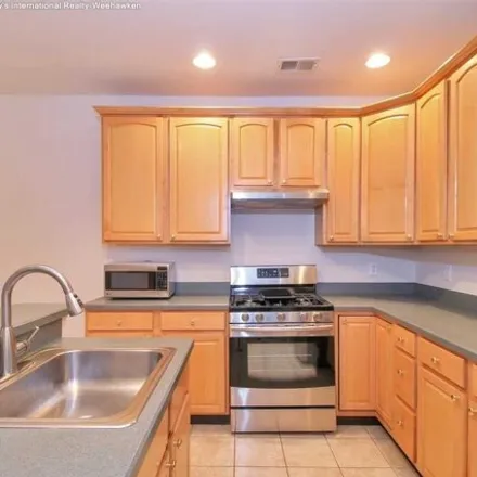 Buy this 3 bed townhouse on 342 Oswego Ct in West New York, New Jersey