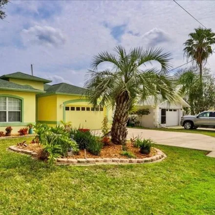 Buy this 3 bed house on 32 Comanche Court in Palm Coast, FL 32137
