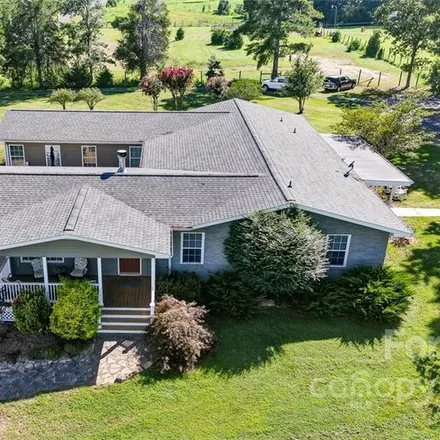 Buy this 4 bed house on 8375 County Line Road in Cabarrus County, NC 28124