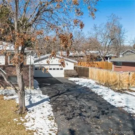 Buy this 4 bed house on 6435 Kendall Street in Arvada, CO 80003