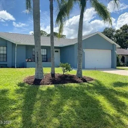 Rent this 4 bed house on 472 Di Lido Street Northeast in Palm Bay, FL 32907