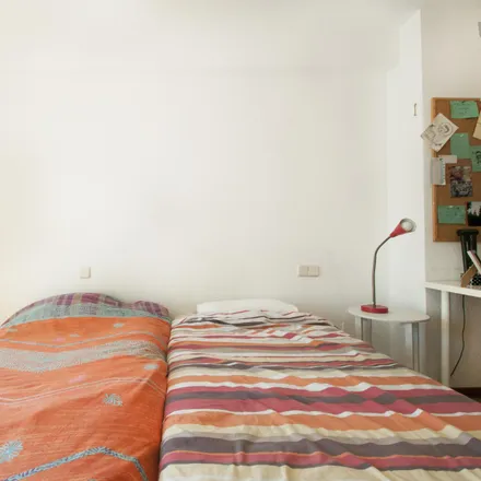 Rent this 4 bed room on Madrid in Edificio Don Pelayo, Calle de Gutenberg