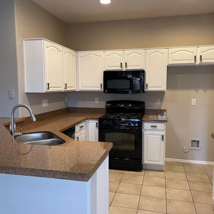 Rent this 4 bed apartment on 3542 South Arroyo Lane in Gilbert, AZ 85297