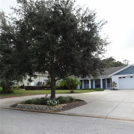 Buy this 3 bed house on 12606 Castleberry Court in Bayonet Point, FL 34667