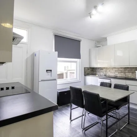 Rent this 3 bed townhouse on Back Ashville Road in Leeds, LS6 1NA