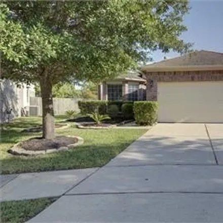 Rent this 3 bed house on 14700 Hawksmoore Court in Harris County, TX 77429
