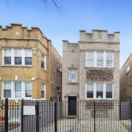 Rent this 3 bed condo on 1052 North Springfield Avenue in Chicago, IL 60651