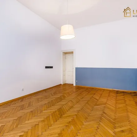 Rent this 3 bed apartment on Podgórska 25 in 31-035 Krakow, Poland