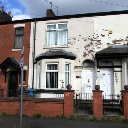 Buy this 3 bed townhouse on Culcheth Lane in Manchester, M40 1WB